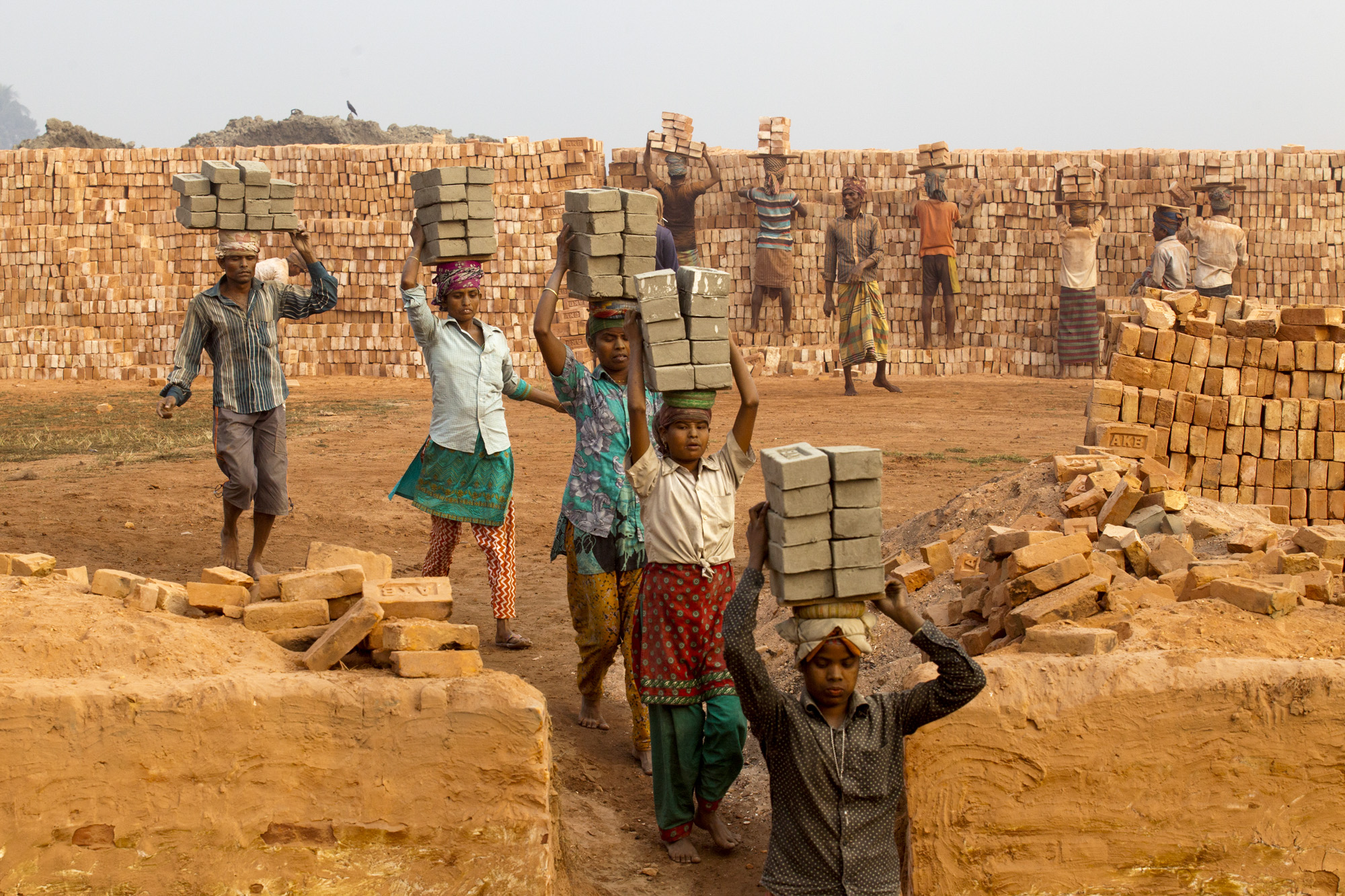 Laborers at a brickfield in Amin Bazar, Dhaka, Bangladesh.