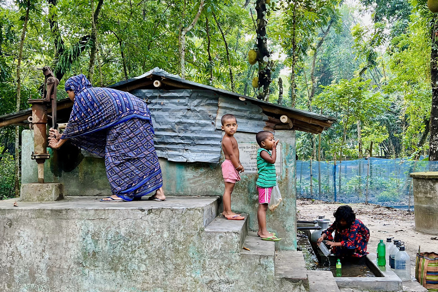 A family collecting water.